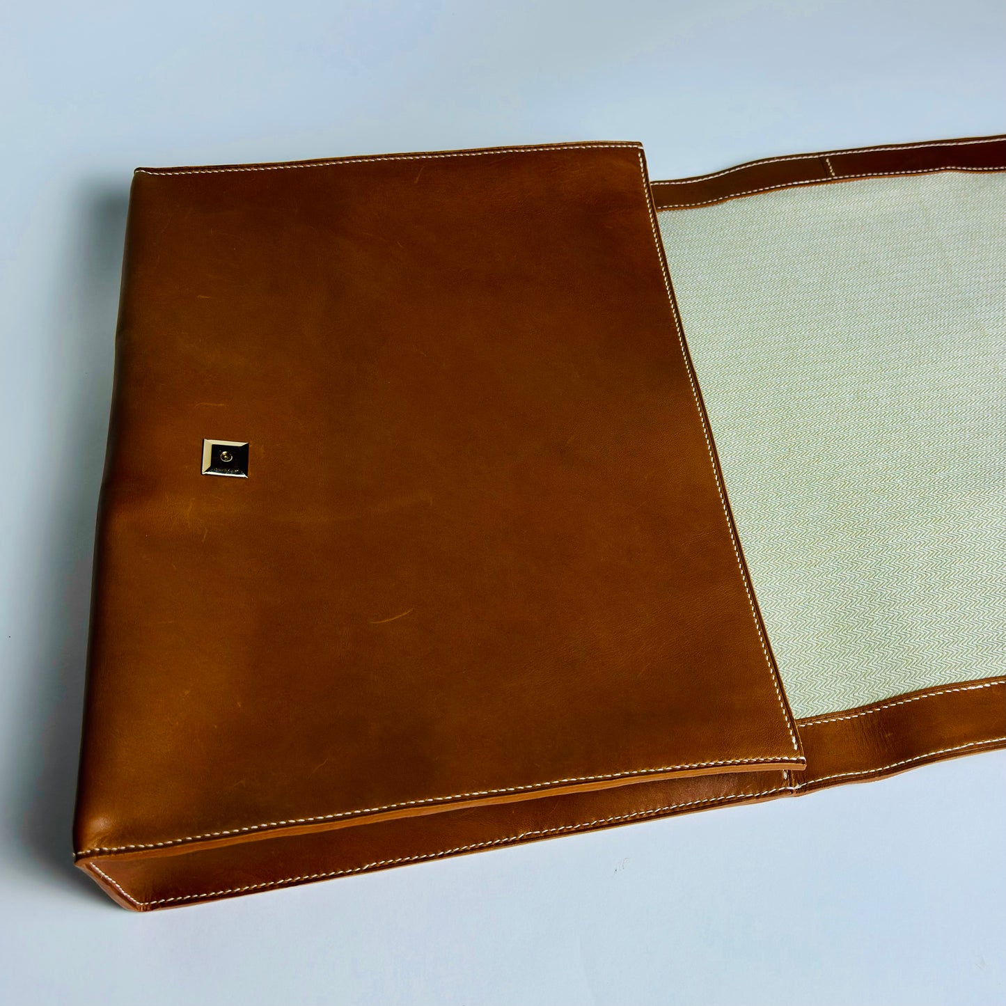 item no 10. yellow zipper briefcase