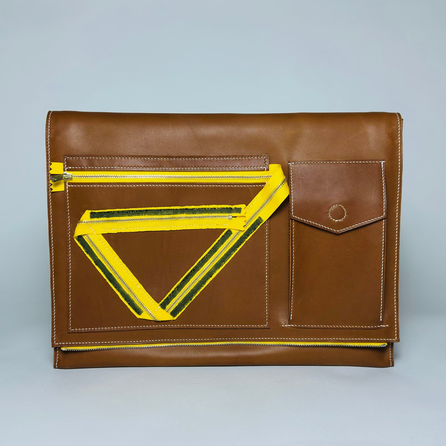 item no 10. yellow zipper briefcase