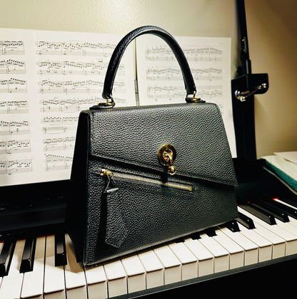 item no 12. trapezoidal purse