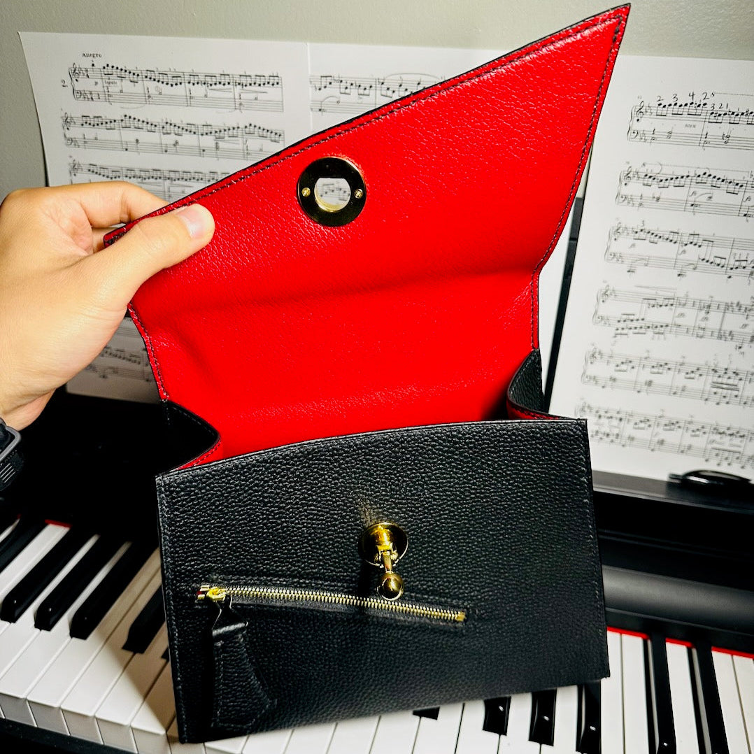 item no 12. trapezoidal purse